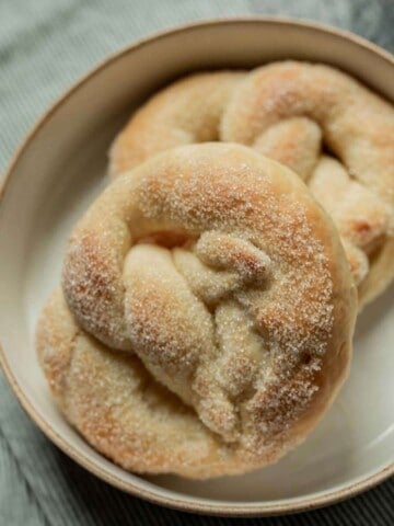 German sugar pretzels on a white plate.