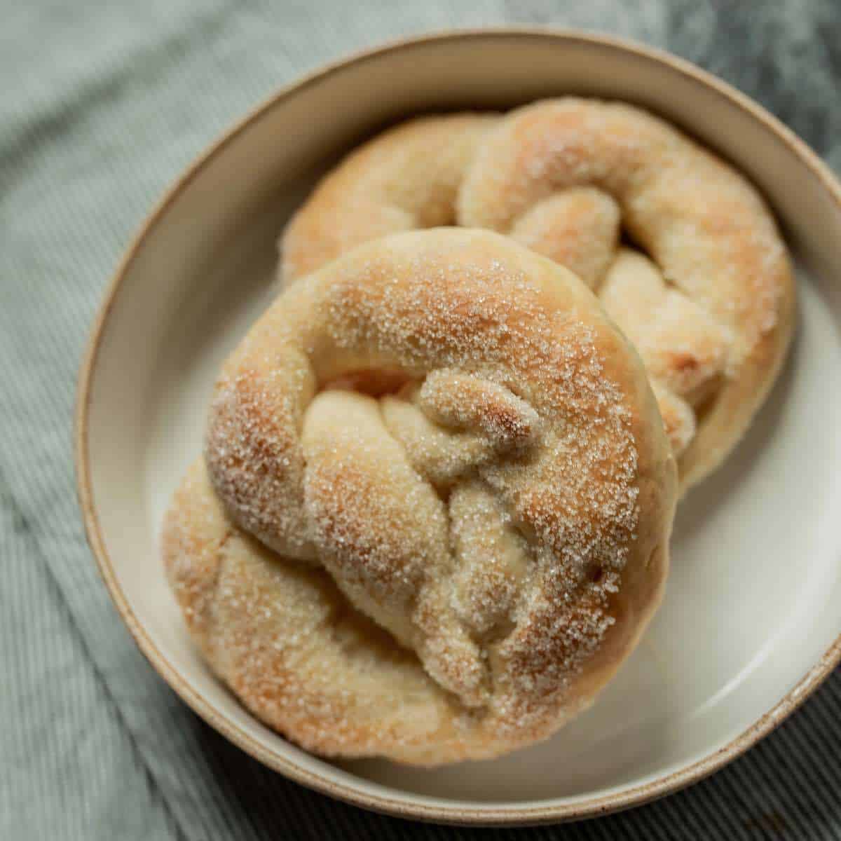 German sugar pretzels on a white plate.