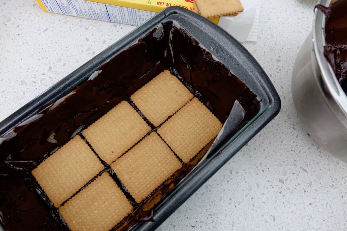 layering German cookies and chocolate ganache for Kalter Hund