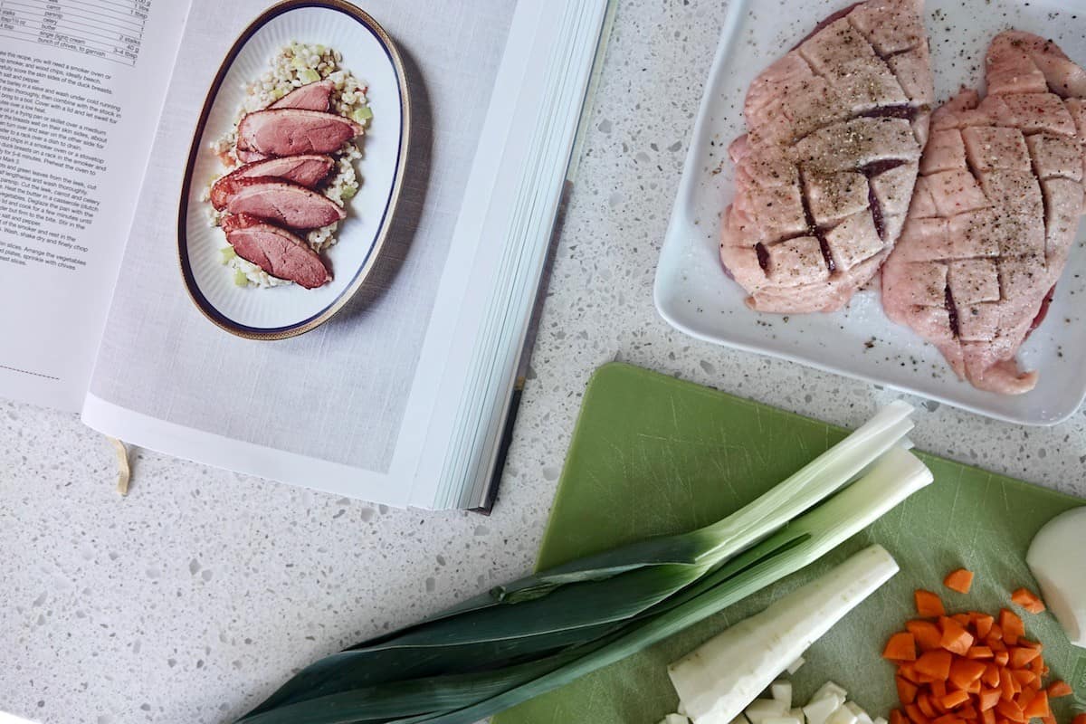 Prepping the duck and veggies for the smoked duck and pearl barley recipe