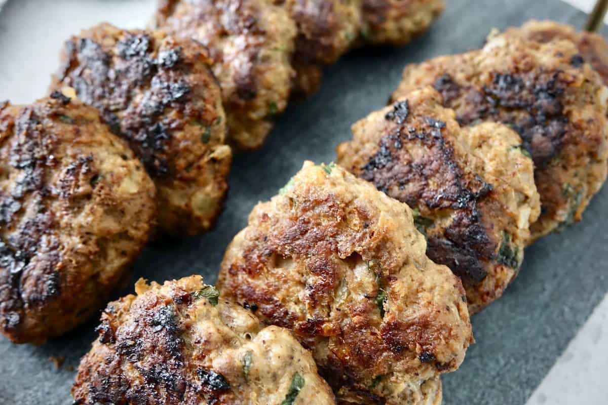 Frikadellen German hamburgers on a marble plate (German hamburgers)