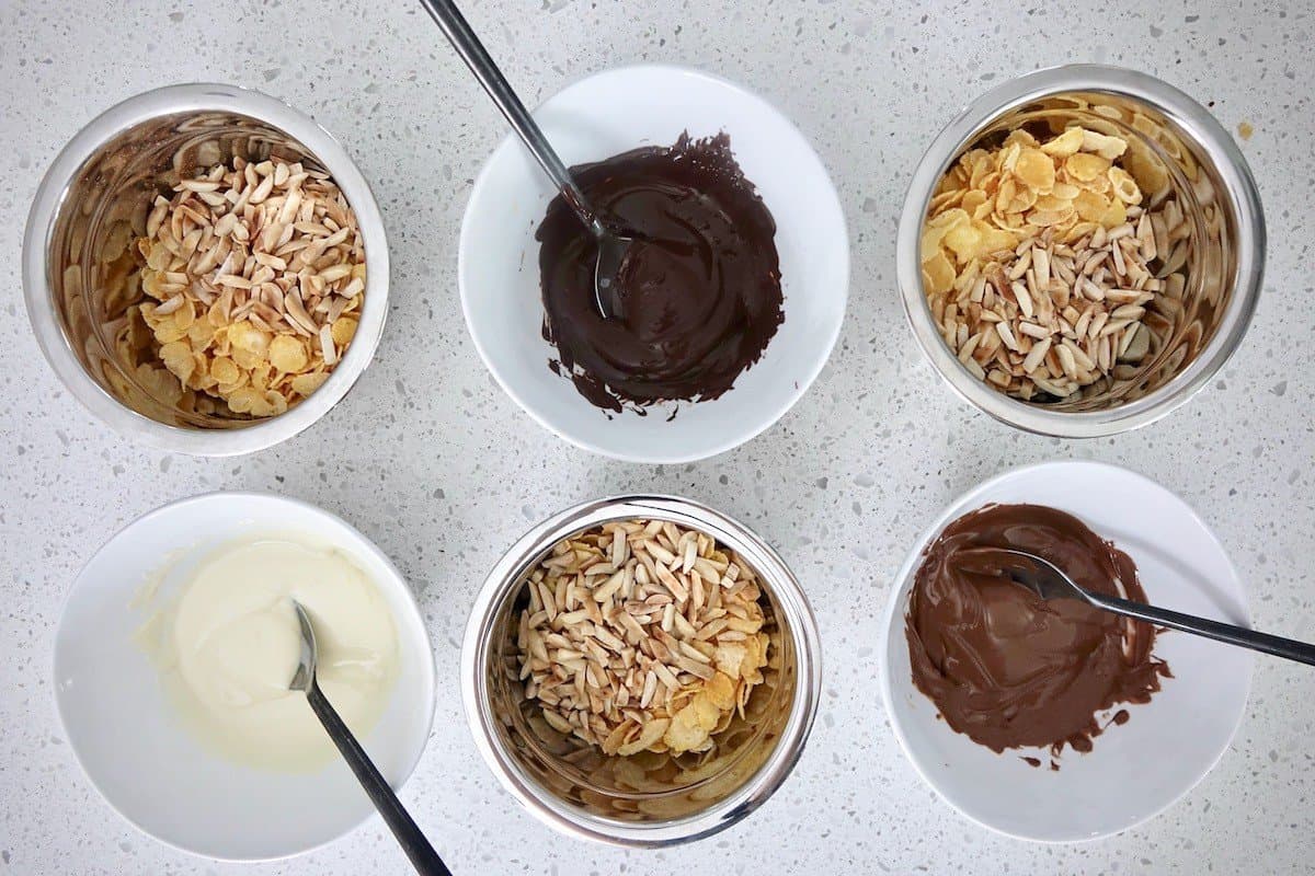 Mixing the cornflakes, chocolate and almonds for Schokocrossies