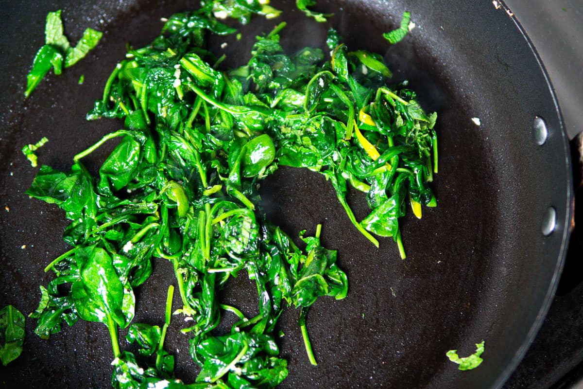 making the spinach filling for pide