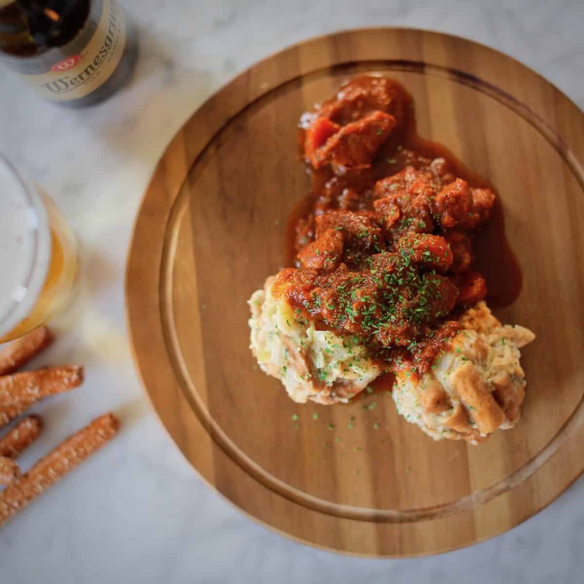 dirndl kitchen pretzel dumplings and beer gulasch24