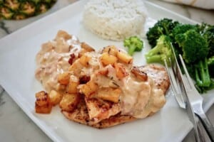 schnitzel Hawaii with creamy pineapple ham cheese sauce