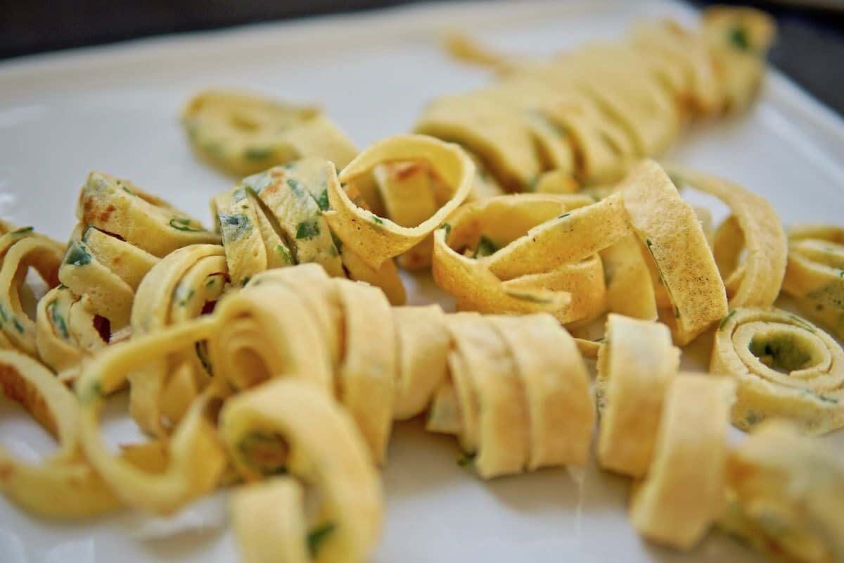 herbed pancakes cut into strips for soup
