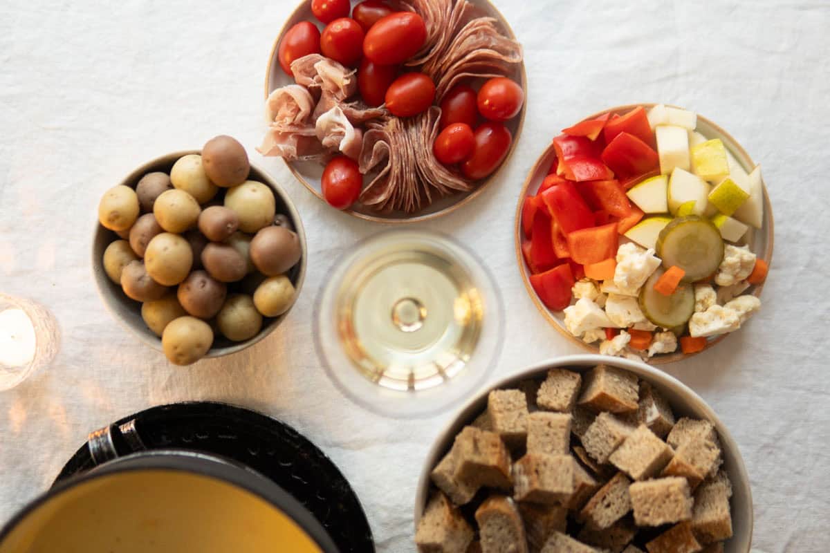 Boiled potatoes and other dippers for Swiss cheese fondue