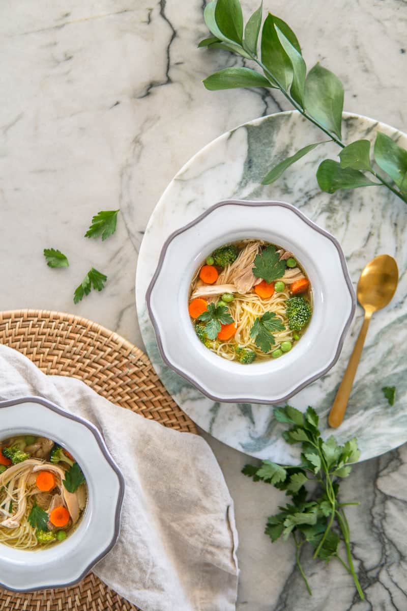 two bowls of chicken noodle soup