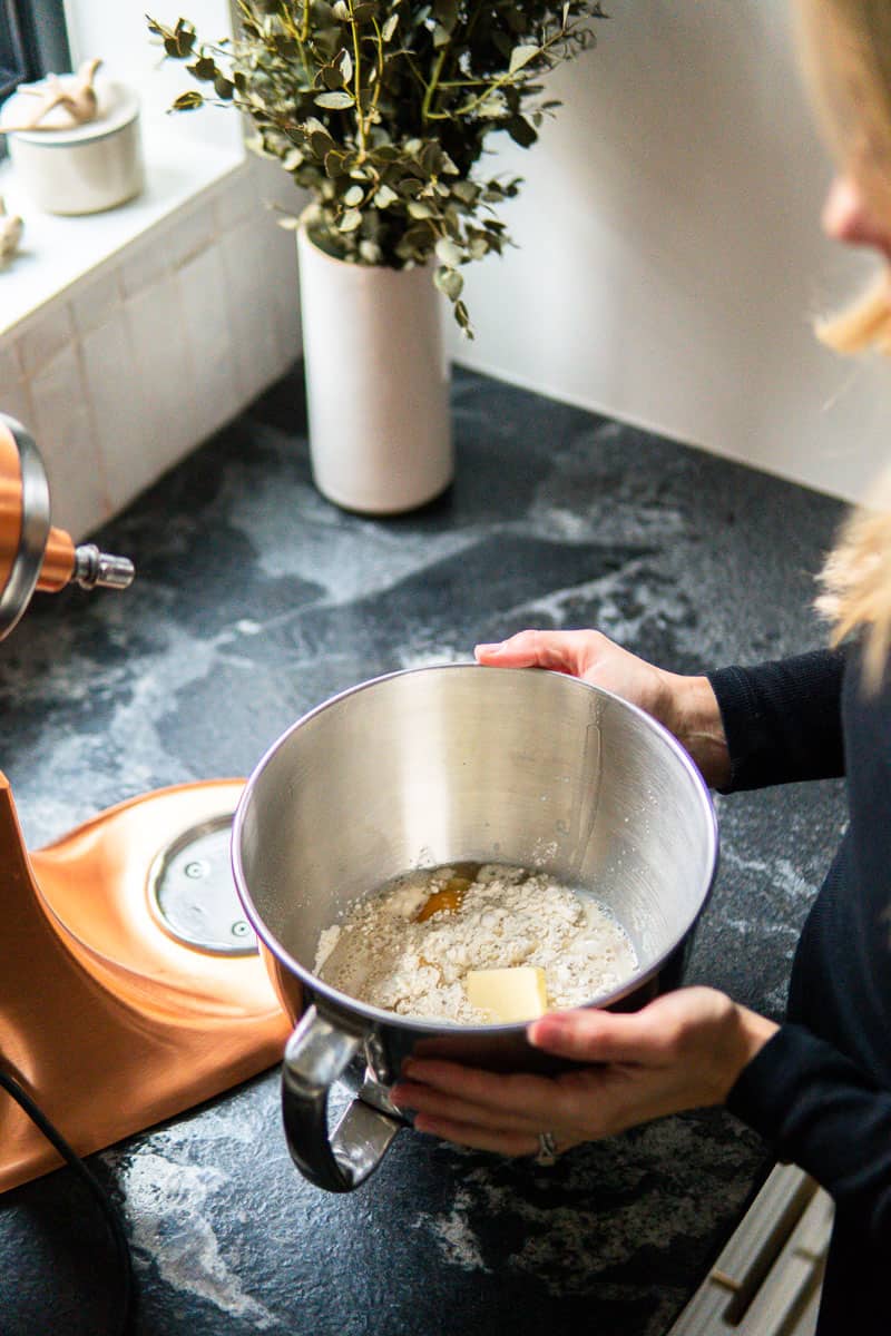 mixing together dough ingredients
