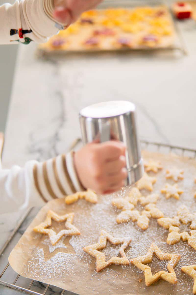 dusting cookies with powdered sugar