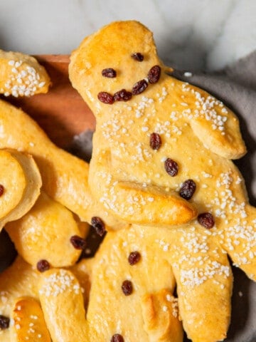 weckmann pastries on a wooden platter