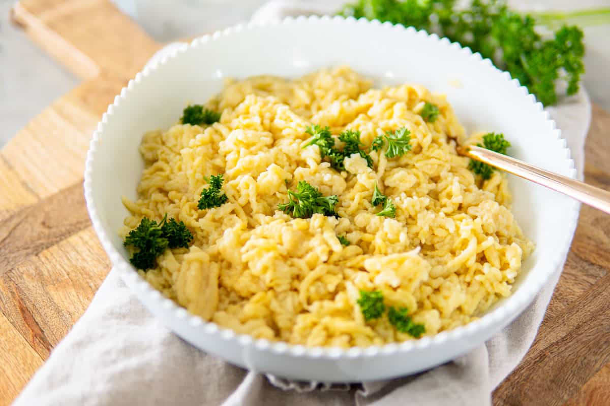 a large bowl of German spätzle topped with parsley