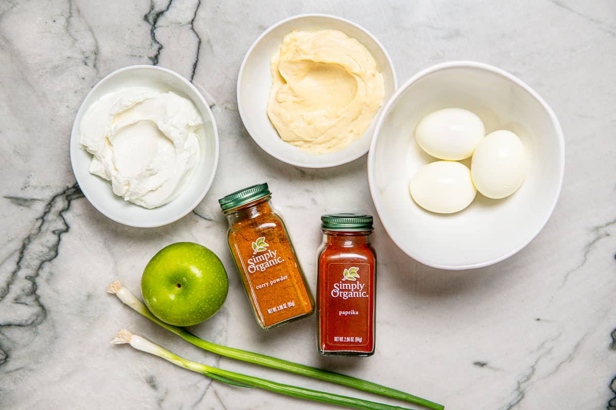 ingredients for healthy egg salad with curry and apples