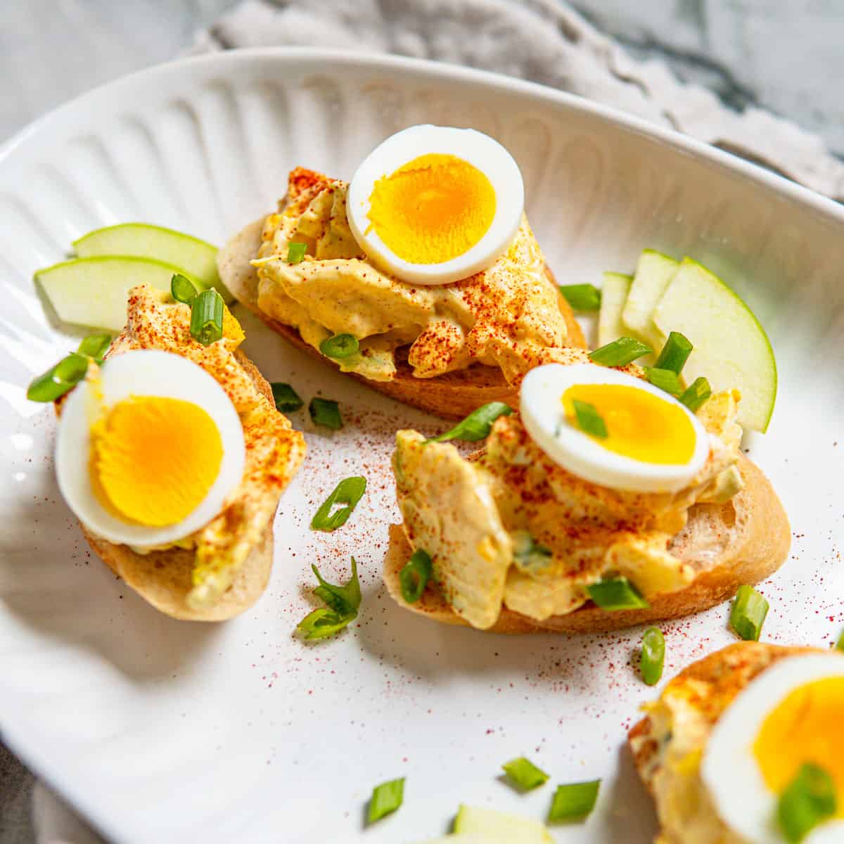 egg salad on baguette slices