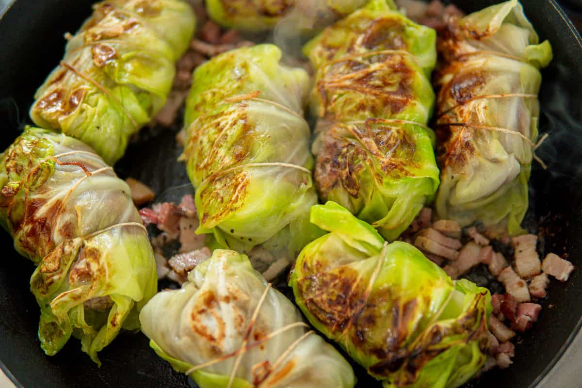 sautéing cabbage rolls with bacon