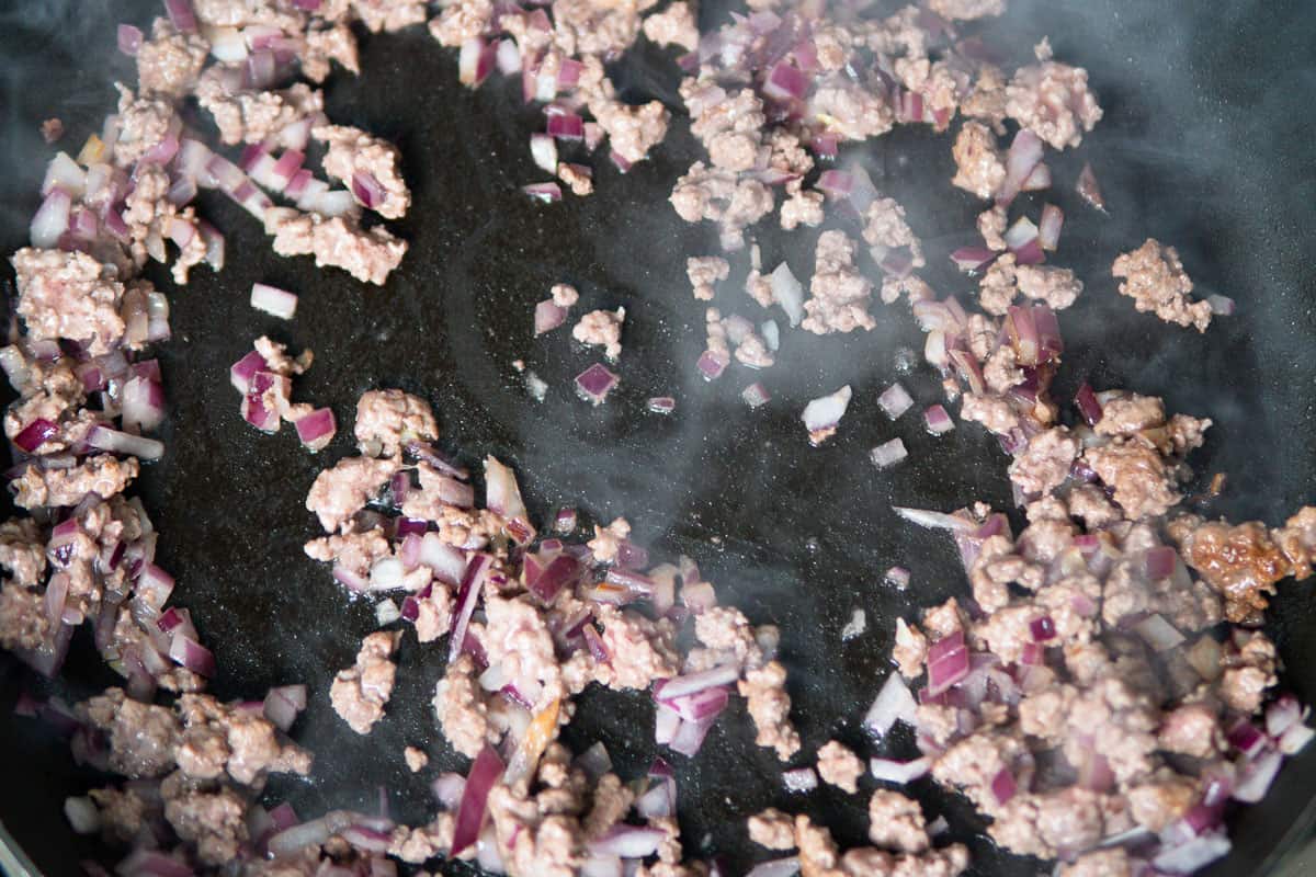 making the ground beef filling for pide