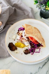 plate with doner kebab sandwich with beef and lamb meat