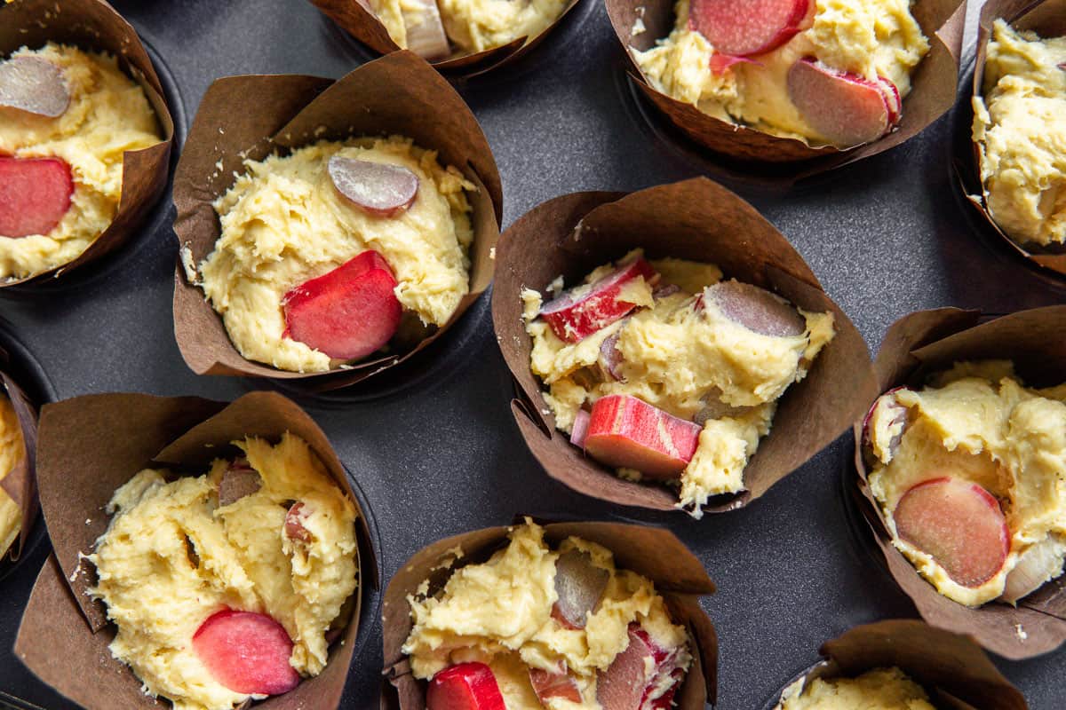 muffin batter divided up into muffin tin