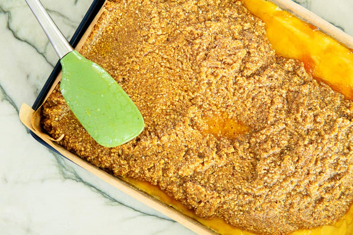 spreading on the nut layer before baking