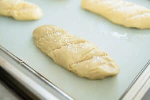 pretzel hot dog buns before baking