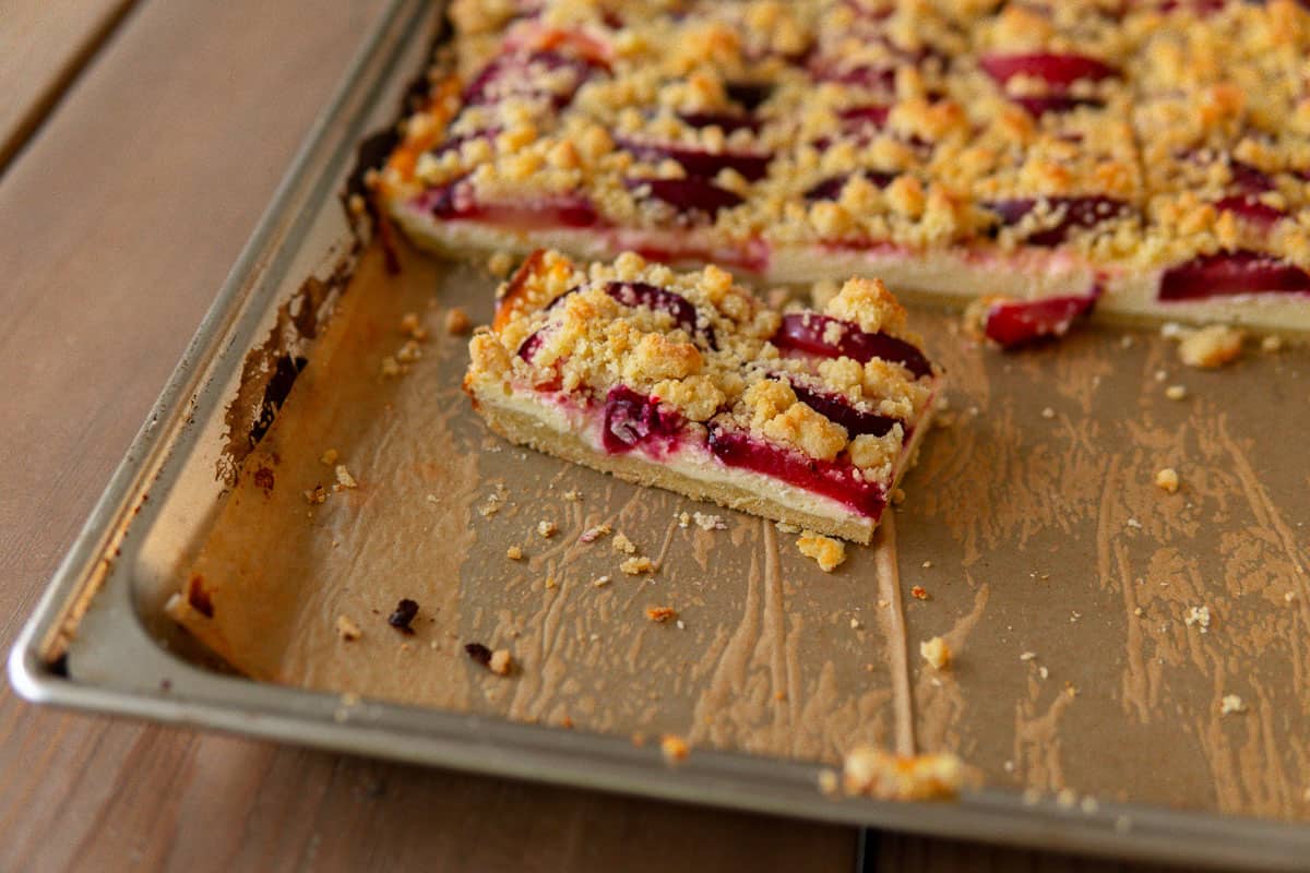 plum cake on a sheet pan after baking