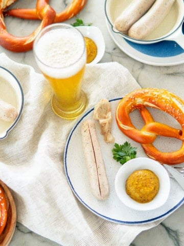 Weisswurst with sweet mustard, pretzel and Weissbier