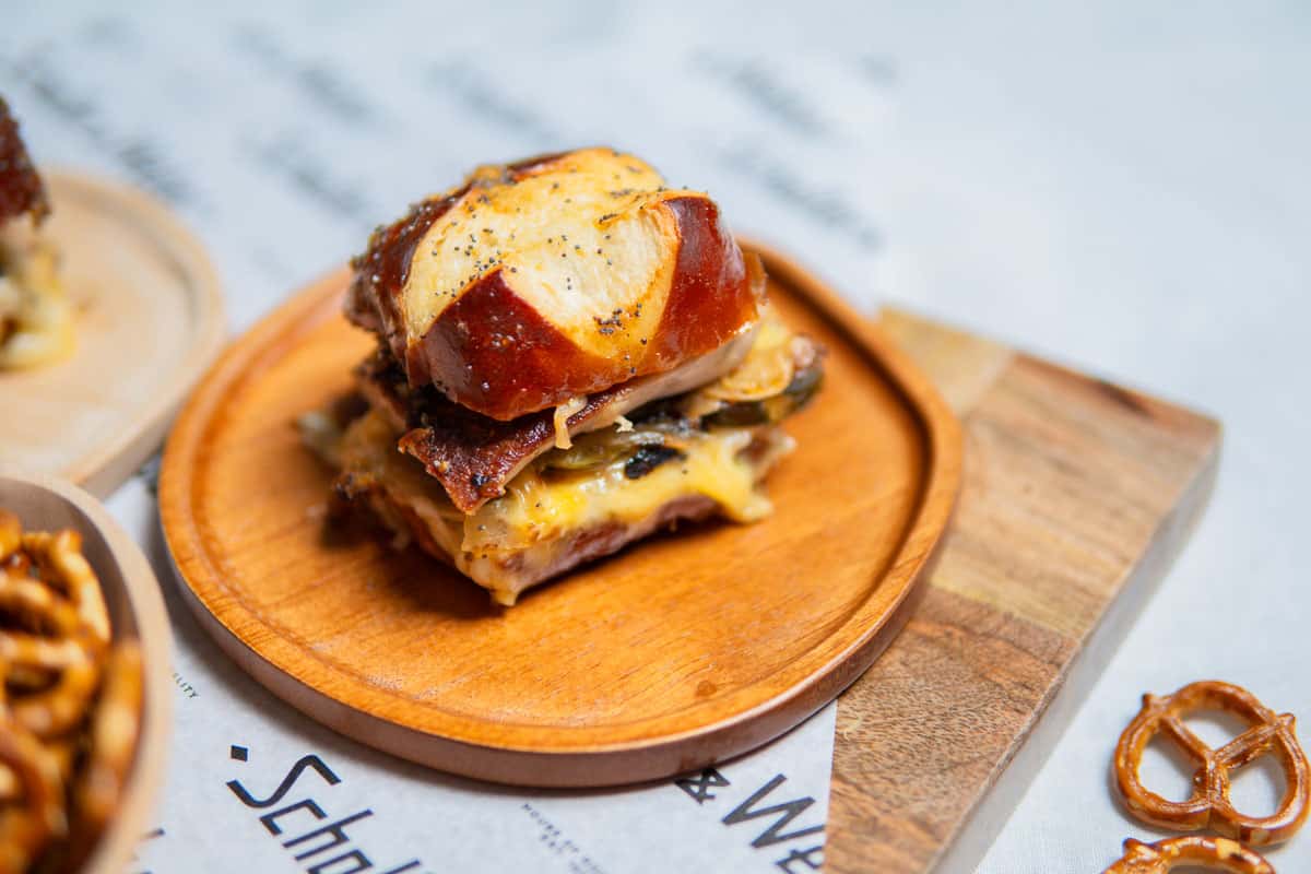 ham and cheese slider on pretzel bun