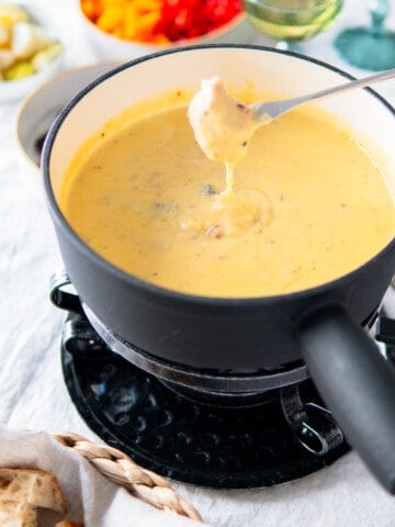 beer cheese fondue in a fondue pot