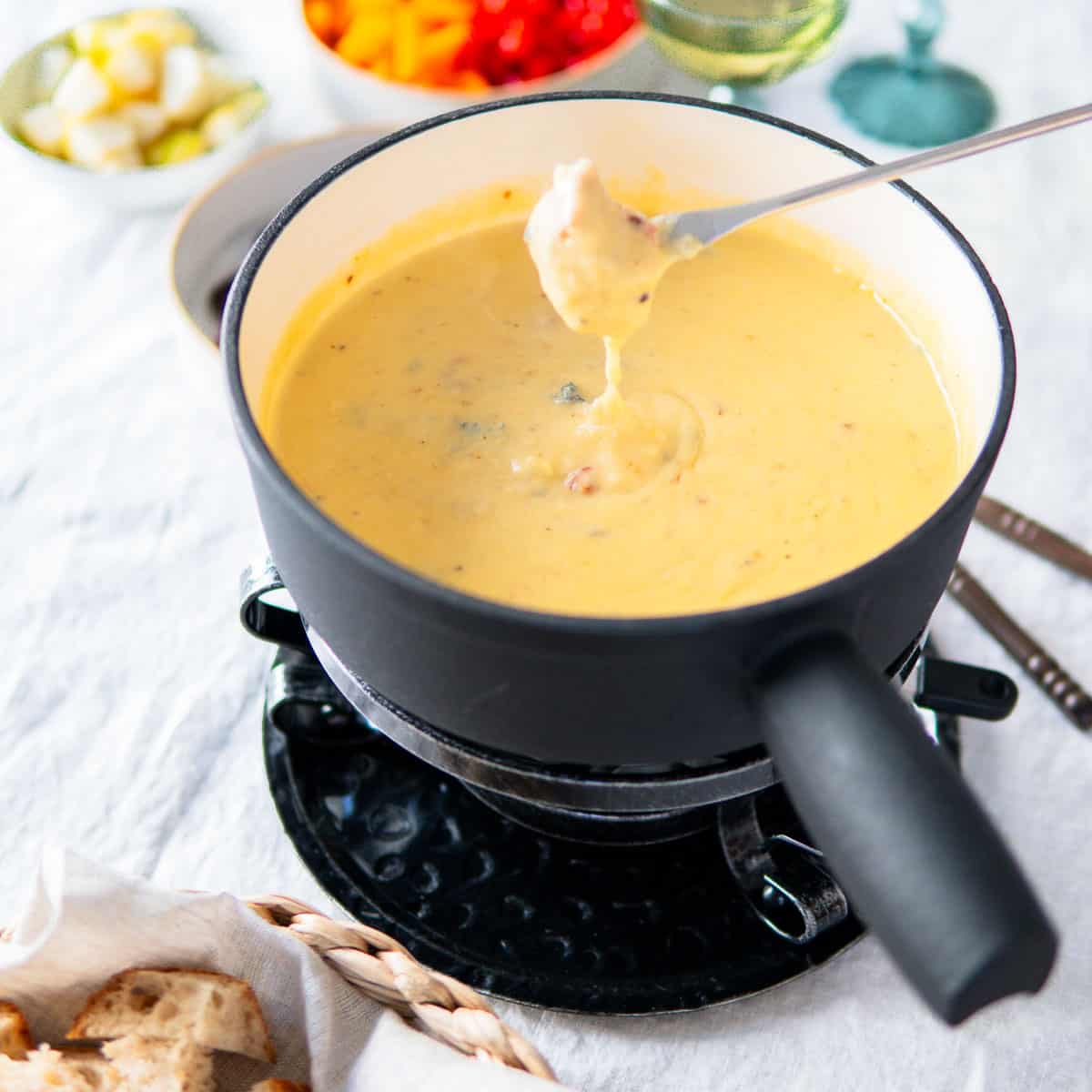 beer cheese fondue in a fondue pot