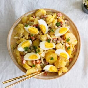 Creamy German potato salad in a white bowl