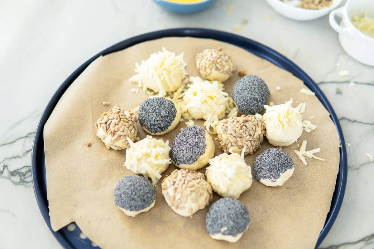 German pull-apart sliders after topping and before baking.