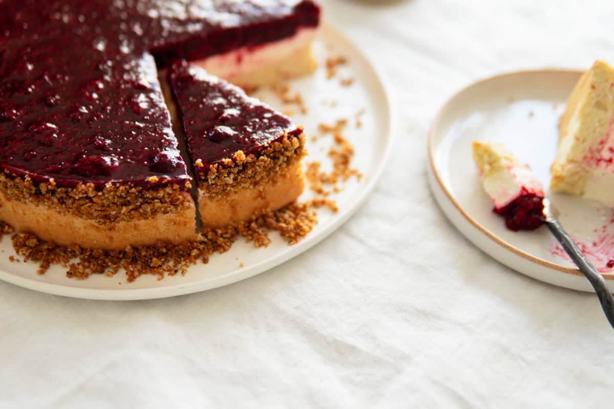 Caramelized hazelnut topping on the outside of a German raspberry cake.