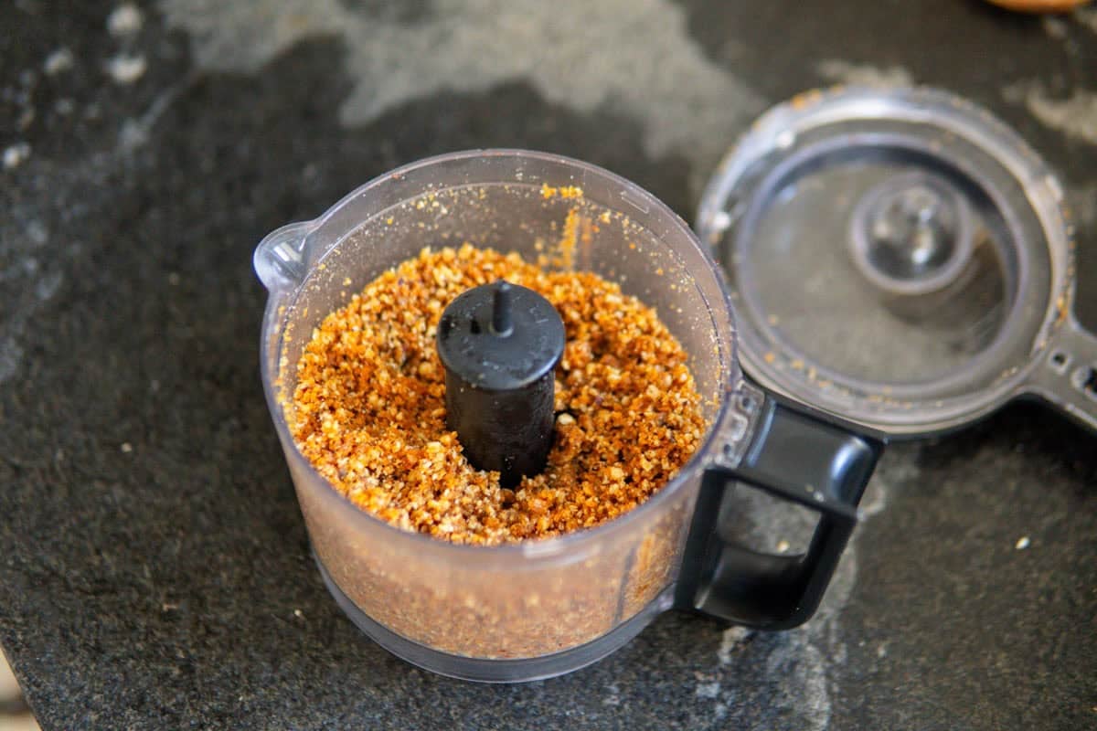 The final caramelized hazelnut topping after processing it in a food processor. It looks like a breadcrumb-texture.