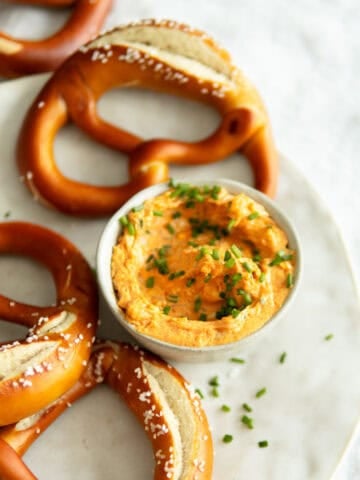 plate with pretzels and Obatzda cheese dip