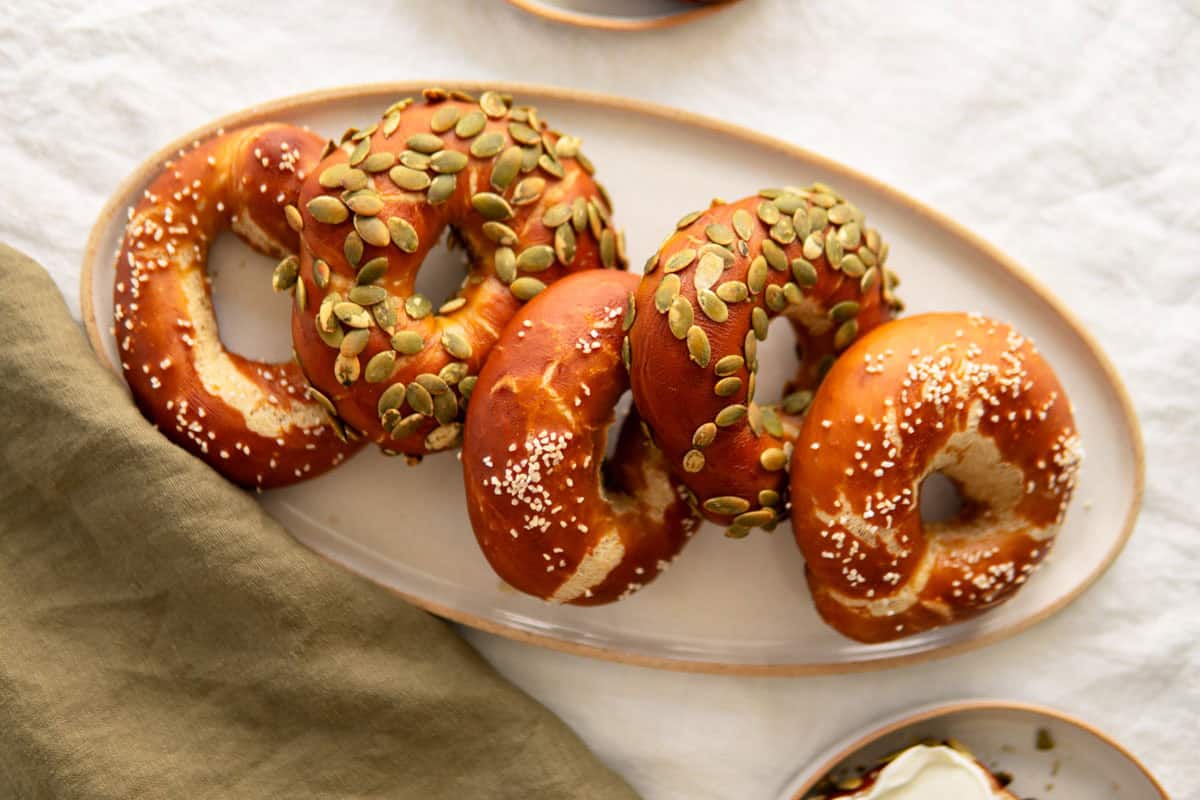 Pretzel bagels on an oval platter.