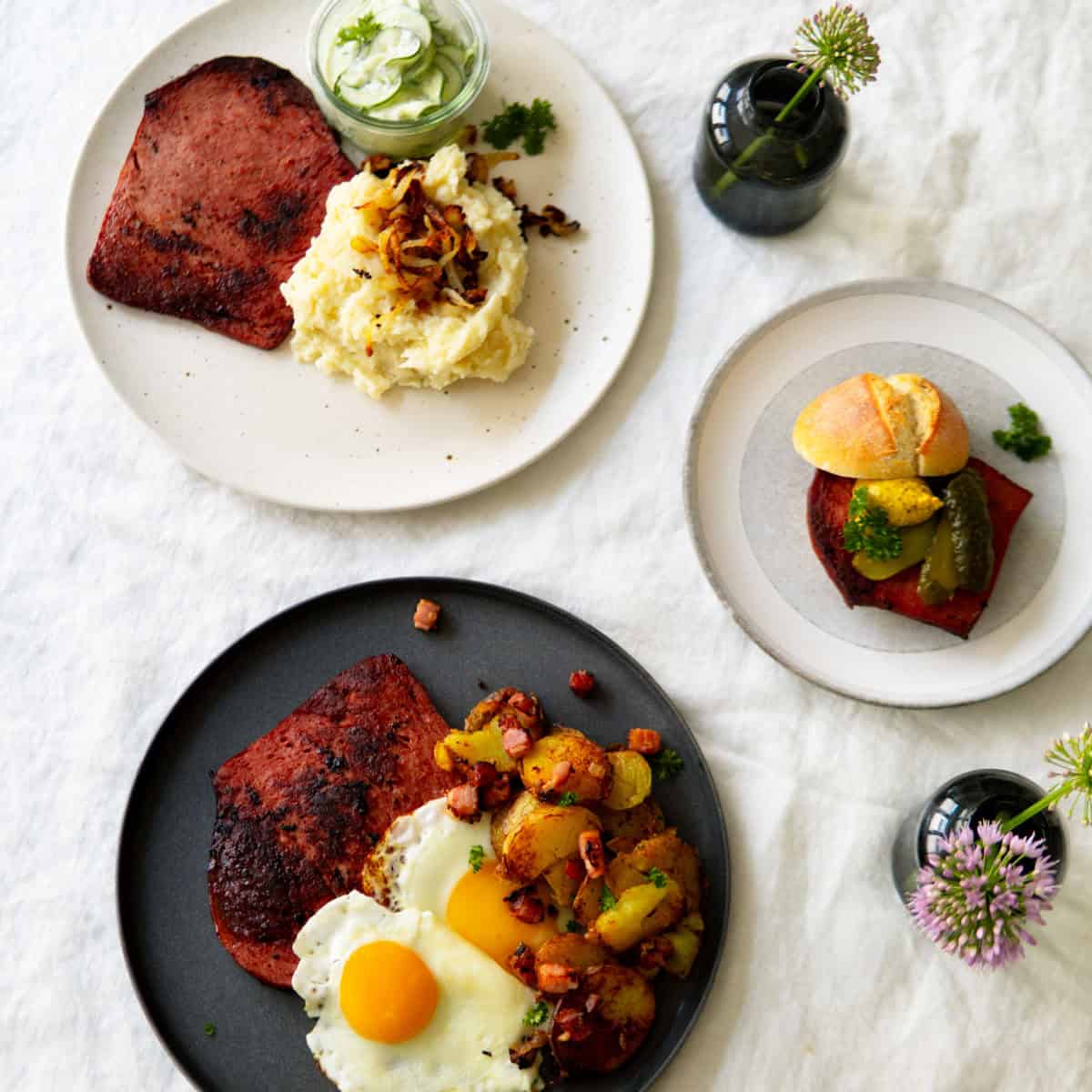 Leberkäse 3 ways on 3 different plates.